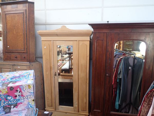 A VICTORIAN STRIPPED PINE WARDROBE