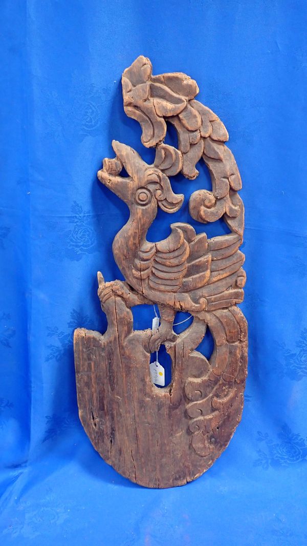 A MALAYSIAN STYLE CARVED WOODEN WALL PANEL