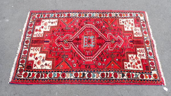 A RED GROUND TURKMAN RUG