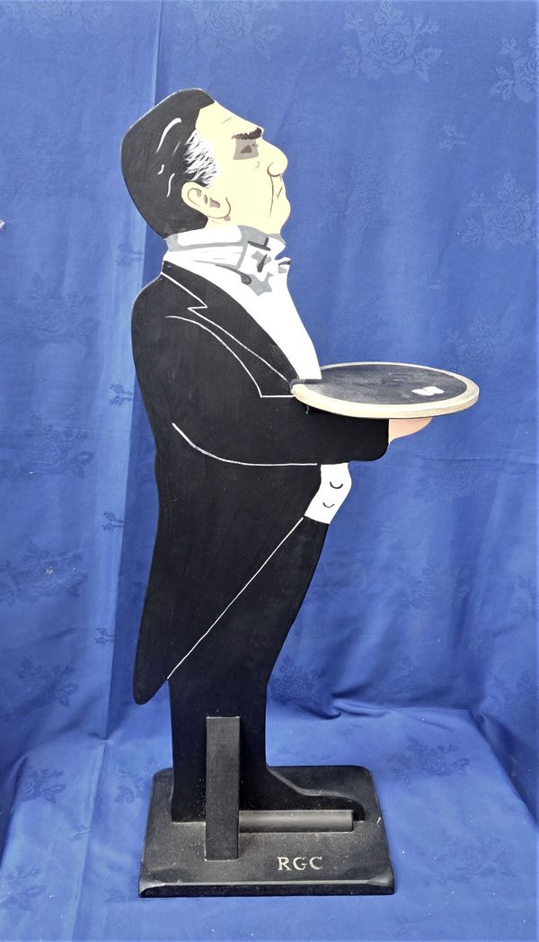 A PAINTED CALLING-CARD HOLDER FLAT FIGURE OF A BUTLER