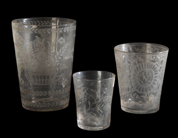 A GROUP OF THREE BOHEMIAN CUT GLASS BEAKERS