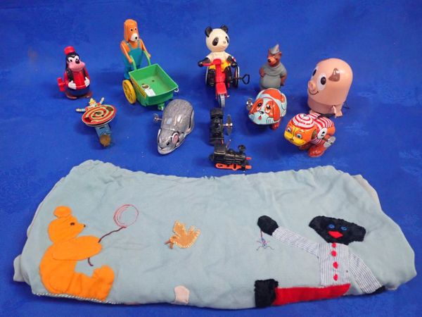 A COLLECTION OF VINTAGE CLOCKWORK TOYS