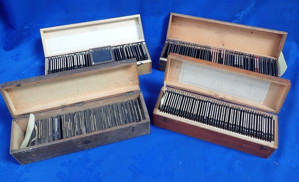 FOUR CASES OF LANTERN SLIDES