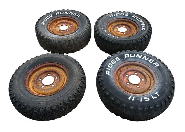 A SET OF FOUR SERIES I LAND ROVER WHEELS