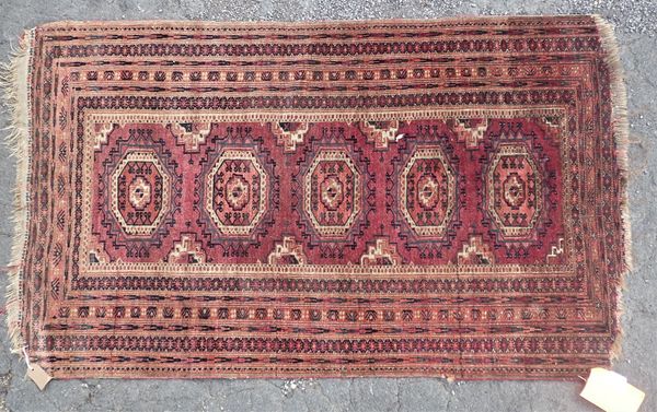 AN ANTIQUE TEKKE TURKMEN RUG