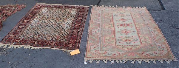 A SERAB STYLE RUG, AND A TURKISH RUG