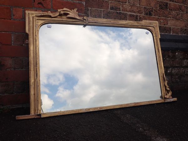 A 19TH CENTURY GILT FRAMED OVERMANTEL MIRROR