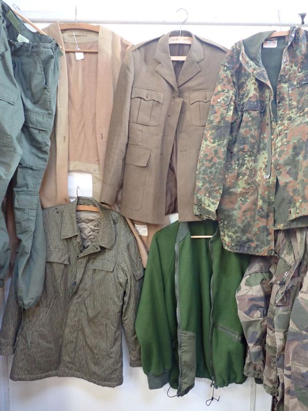 A COLLECTION OF MILITARY JACKETS ETC