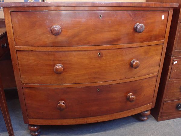 A 19TH CENTURY MAHOGANY BOWFRONT CHEST OF DRAWERS