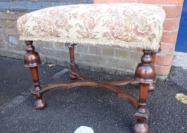 A WILLIAM AND MARY STYLE WALNUT FOOTSTOOL