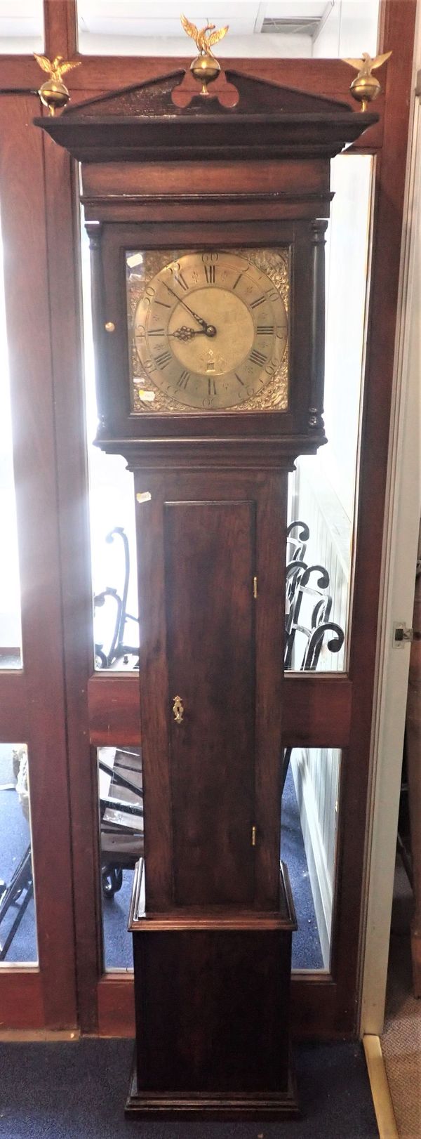 A MID 18TH CENTURY OAK LONGCASE CLOCK