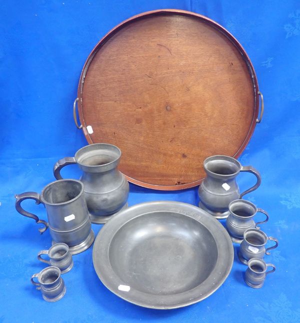 A GROUP OF VICTORIAN  PEWTER MEASURES OF VARYING CAPACITY