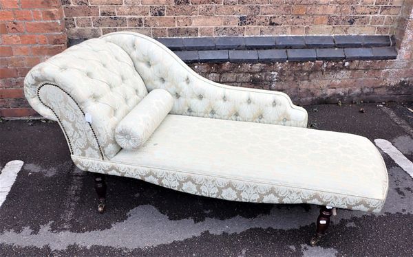 A REPRODUCTION CHAISE LONGUE, IN GREEN DAMASK