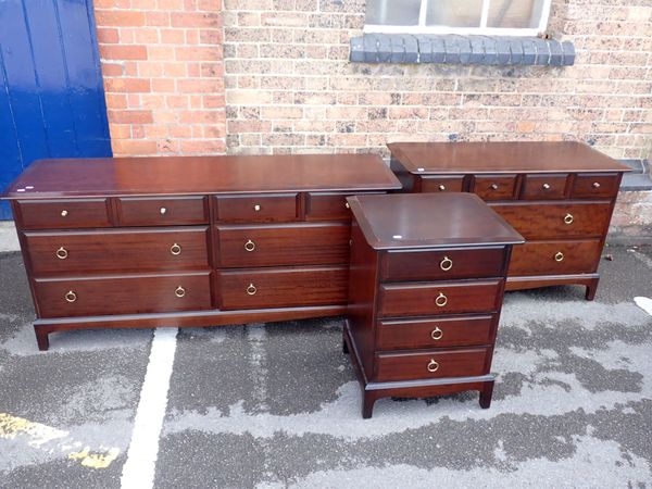 A STAG CHEST OF DRAWERS, ANOTHER SMALLER, AND A BEDSIDE CHEST