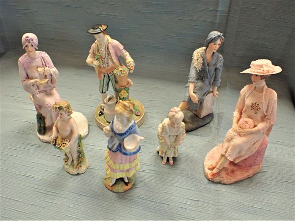 A GROUP CONTINENTAL FIGURINES