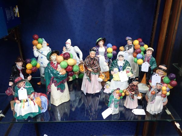 A COLLECTION OF ROYAL DOULTON BALLOON SELLER FIGURINES