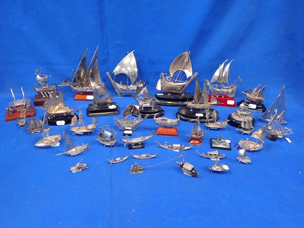 A COLLECTION OF WHITE METAL SHIP MODELS