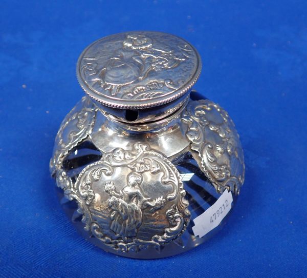 A SILVER MOUNTED GLASS INKWELL