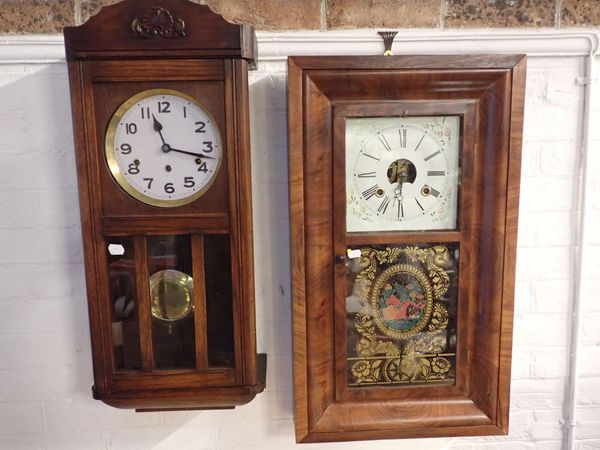 AN AMERICAN 'OG' MAHOGANY CASED WALL CLOCK