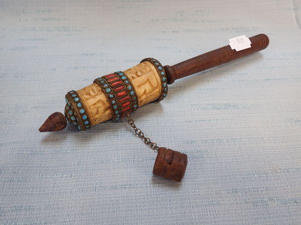 A TIBETAN PRAYER WHEEL