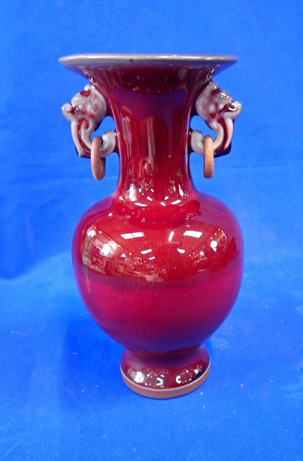 A  CHINESE QING DYNASTY MARKED SANG DE BOEUF GLAZED VASE