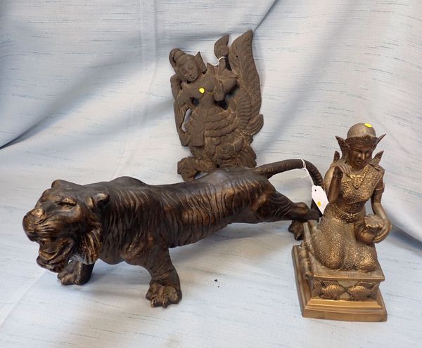 A BROWN PATINATED CAST METAL TIGER