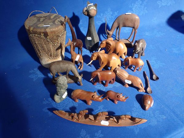 A COLLECTION OF CARVED WOOD ANIMALS
