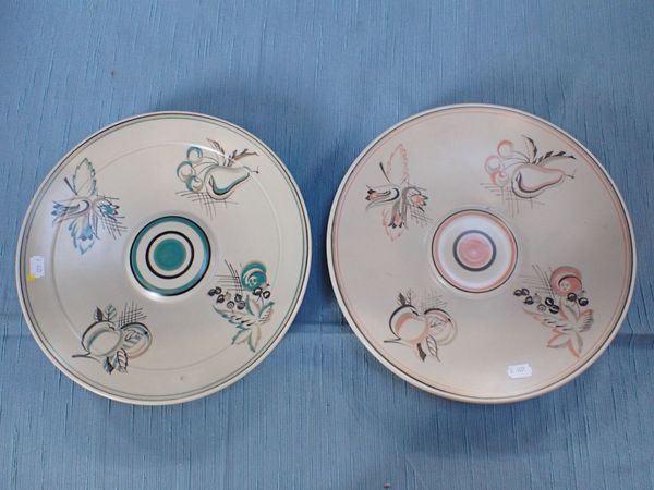 TWO POOLE POTTERY DISHES, PAINTED WITH FRUIT