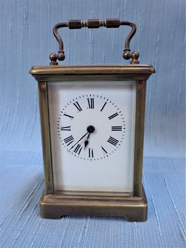 A BRASS CASED CARRIAGE CLOCK