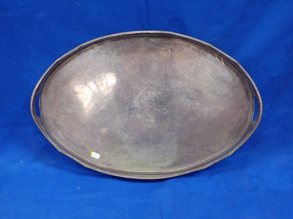 A SILVER-PLATED GALLERIED OVAL TRAY