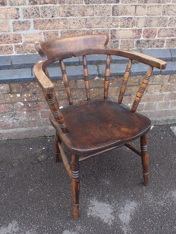 A BEECH AND ELM SEATED CAPTAIN'S CHAIR
