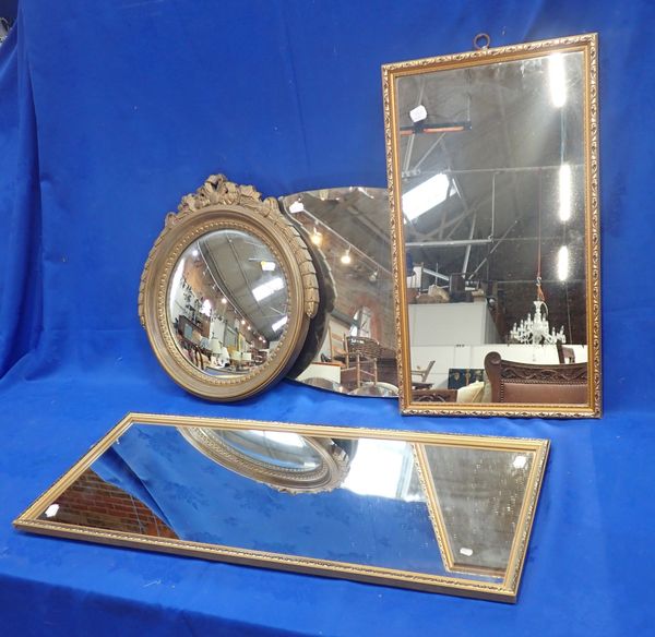 A GILT COMPOSITION EMPIRE STYLE CONVEX WALL MIRROR