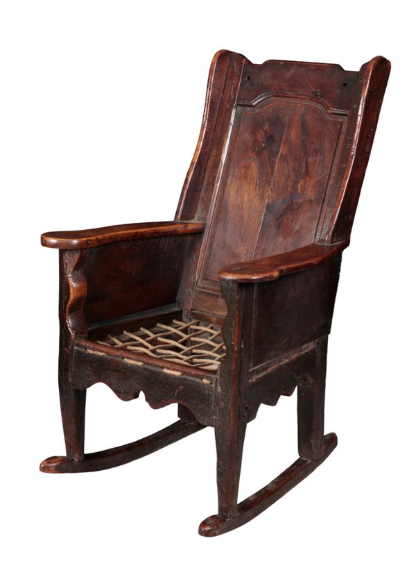 A VENACULAR OAK ROCKING CHAIR, PROBABLY WESTMORLAND