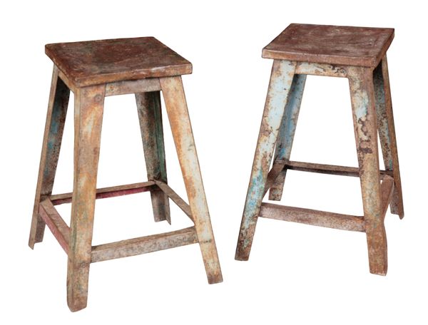 TWO PAINTED AND DISTRESSED METAL STOOLS