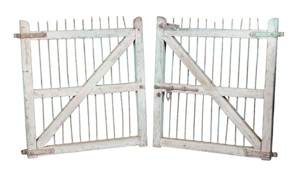 A PAIR OF GREEN-PAINTED OAK AND CAST IRON GATES