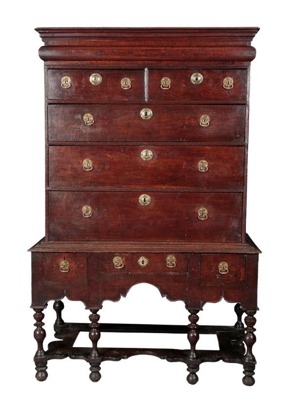 A WILLIAM AND MARY STYLE OAK CHEST ON STAND