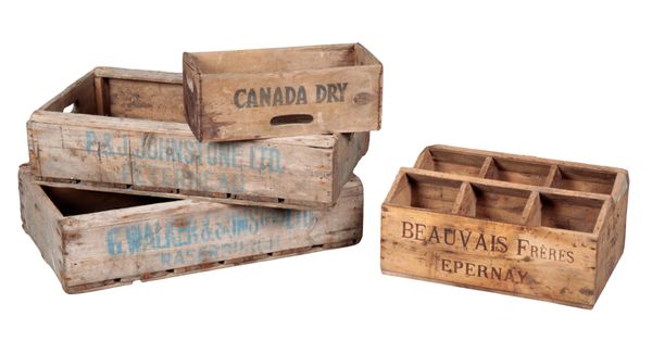 A GROUP OF NINE VINTAGE CRATES