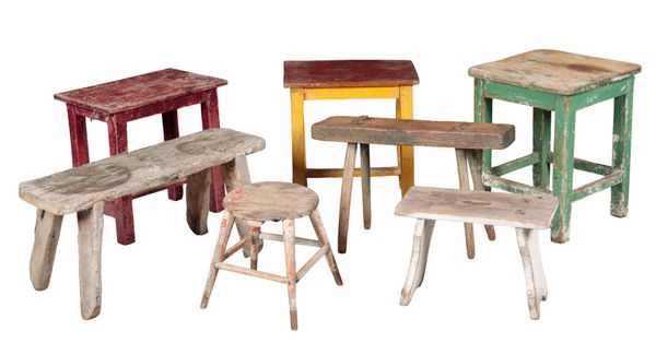 A GROUP OF SEVEN VINTAGE STOOLS