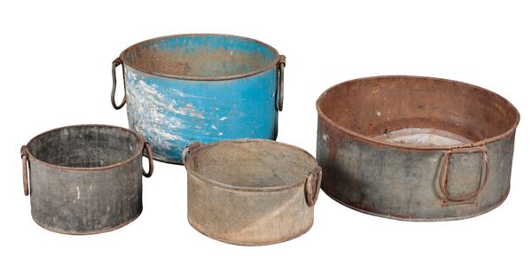 A GROUP OF FOUR GALVANISED JARDINIERES