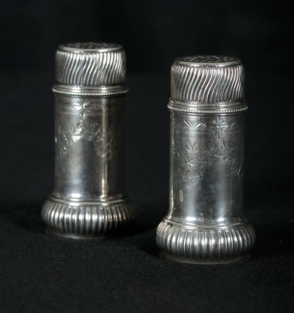 A PAIR OF AMERICAN STERLING SILVER SALT AND PEPPER POTS