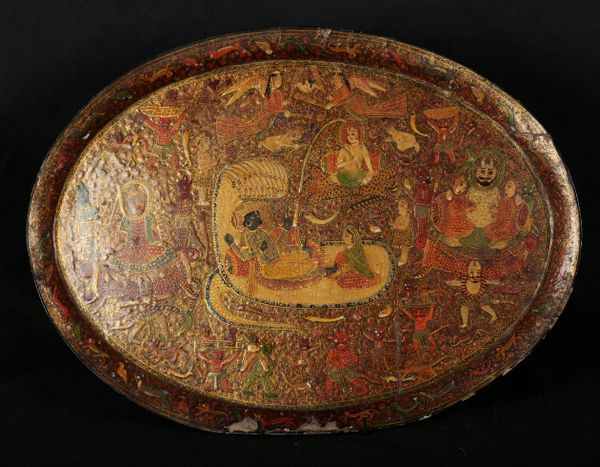 AN ANTIQUE KASHMIRI LACQUERED PAPIER MACHE OVAL TRAY