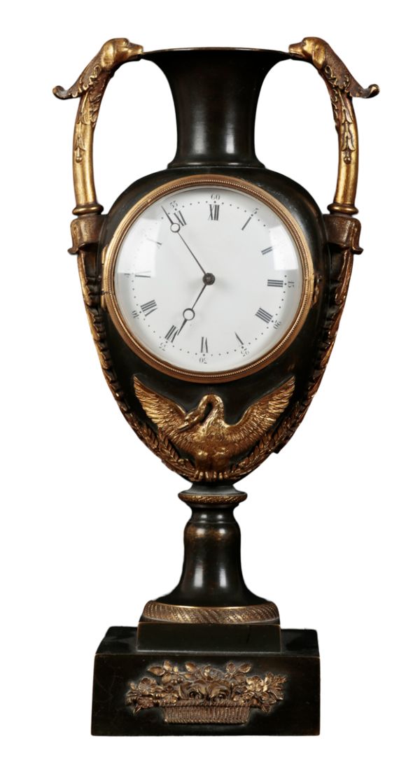 A FRENCH EMPIRE STYLE MANTEL CLOCK