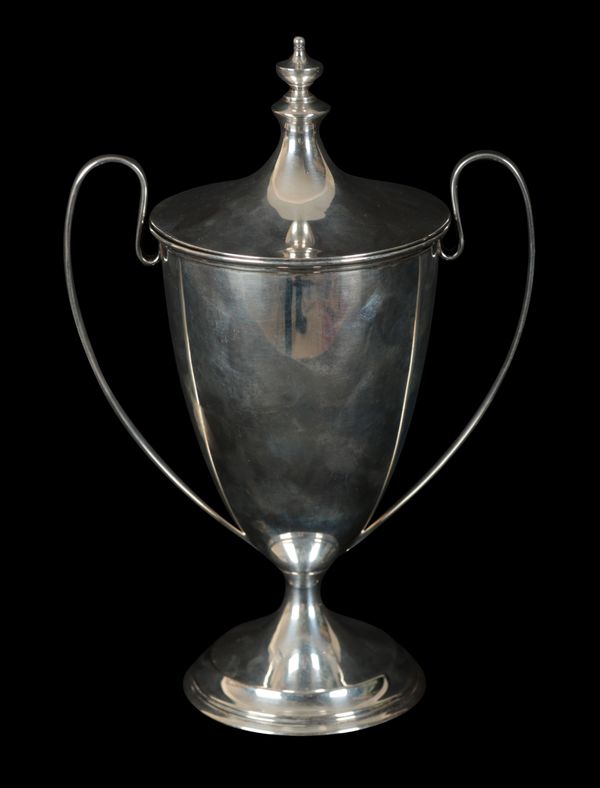 A GEORGE V SILVER TWO HANDLED LIDDED TROPHY