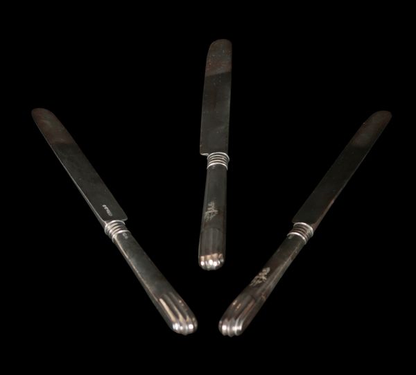 A SET OF TWELVE GEORGE III SILVER FRUIT KNIVES AND FORKS