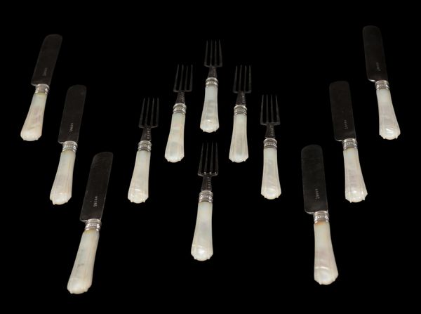 A SET OF SIX VICTORIAN MOTHER OF PEARL HANDLED FRUIT KNIVES & FORKS