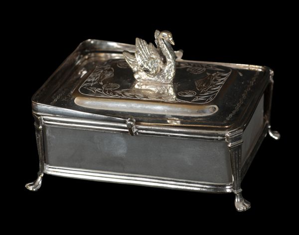 A SILVER PLATED SARDINE BOX