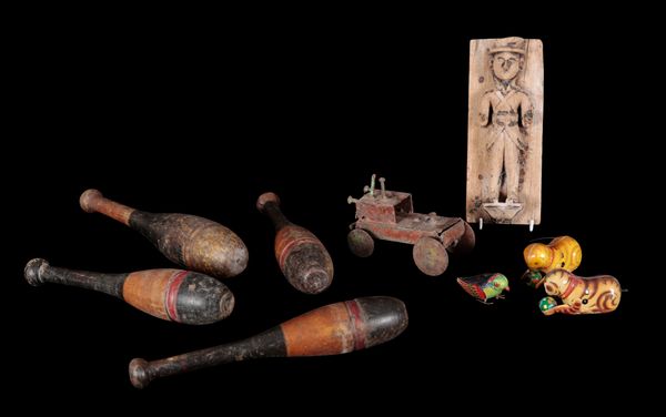 A GROUP OF THREE CLOCK WORK TINPLATE TOYS