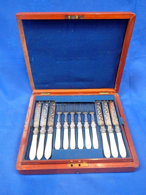 A CANTEEN OF FRUIT KNIVES AND FORKS