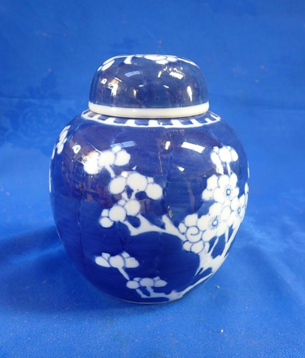 A CHINESE BLUE DECORATED PRUNUS JAR AND COVER