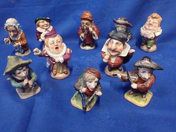 A COLLECTION OF NAPLES PORCELAIN DWARVES